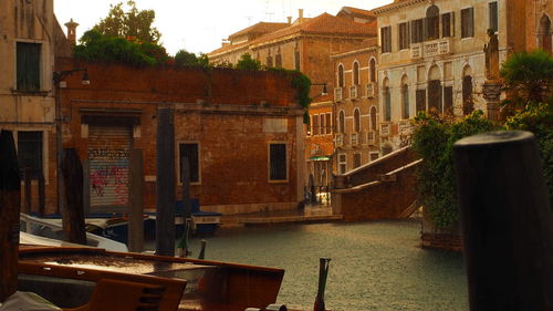 Canal amidst buildings in city