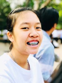 Close-up portrait of smiling girl