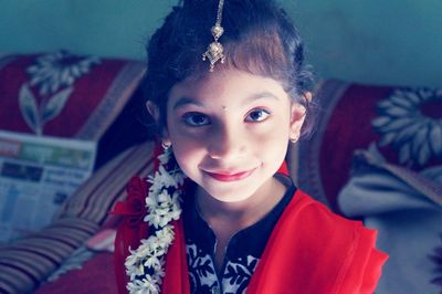 Portrait of smiling girl at home