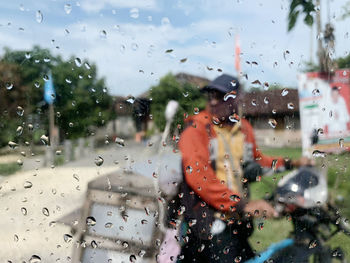 Abstract background of window glass during rain