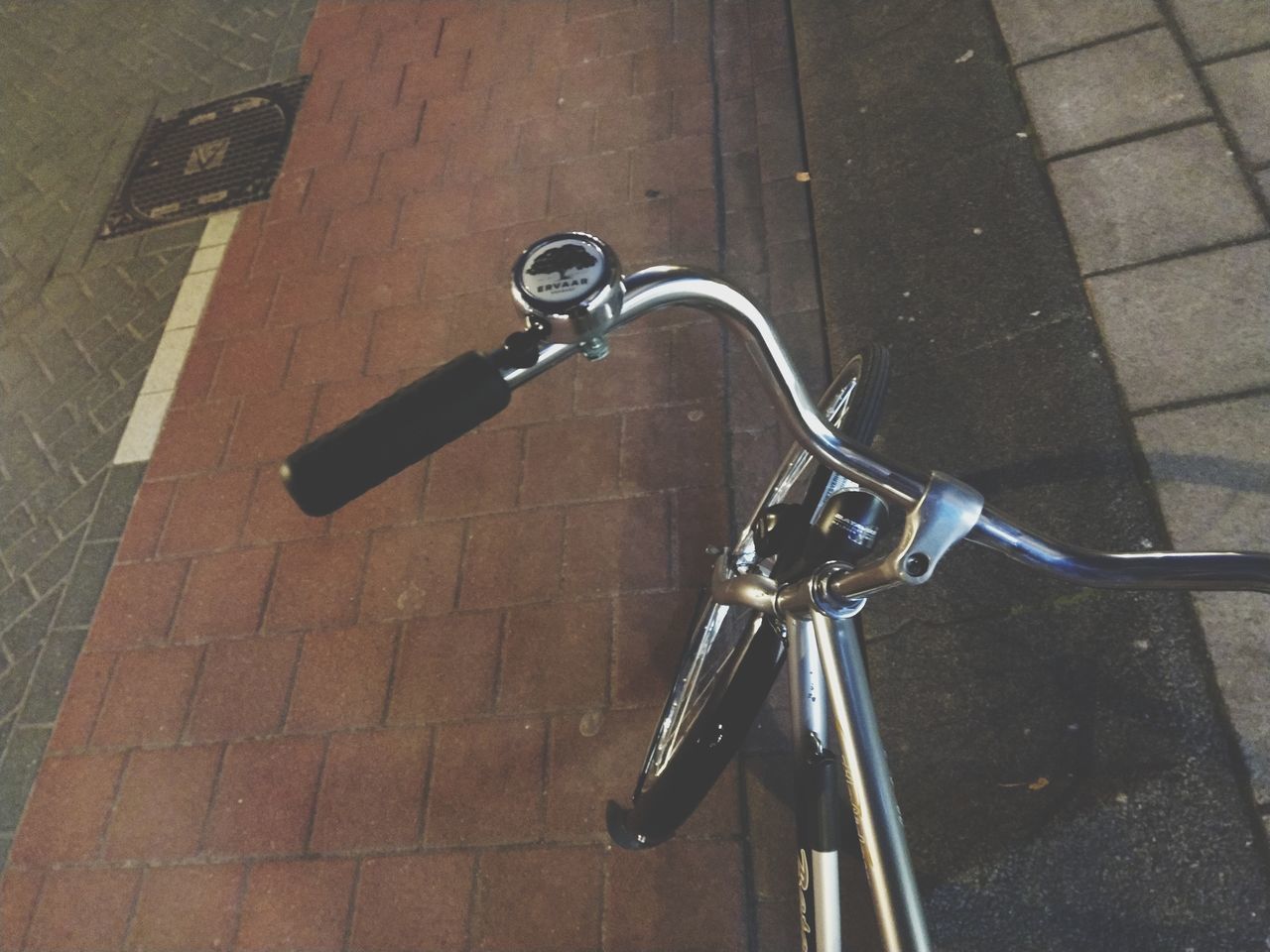 HIGH ANGLE VIEW OF BICYCLE WHEEL