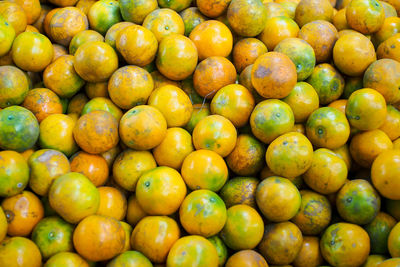 Full frame shot of oranges in market