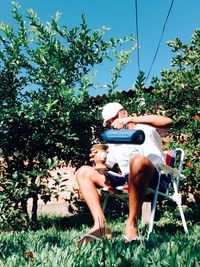 Man sitting in yard