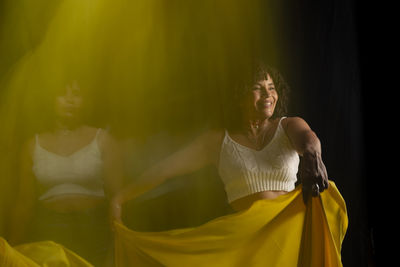 Time lapse view of woman moving a rag. long exposure, motion blur. 