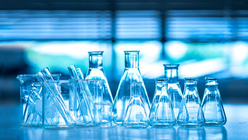 Close-up of laboratory glassware on table