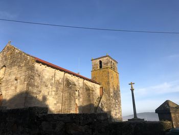 Low angle view of historic building against sky