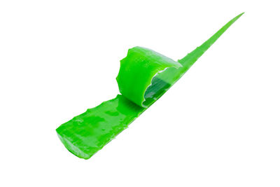 Close-up of green leaf against white background