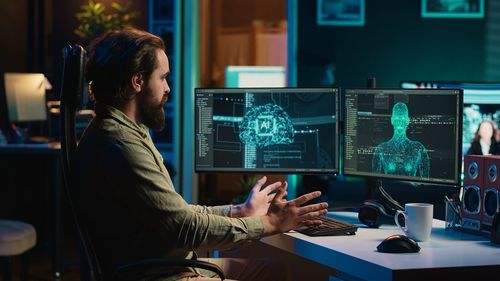 Man using laptop at home