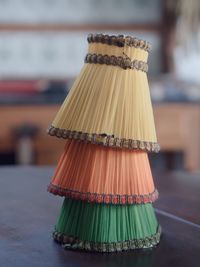 Close-up of bread on table against building
