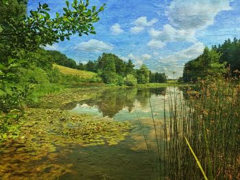 Scenic view of lake against sky