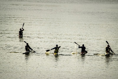 High angle view of people kayaking in river