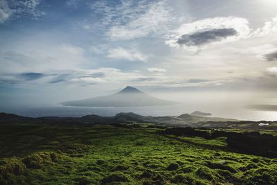 View of landscape against cloudy sky