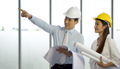 Young man working in mirror
