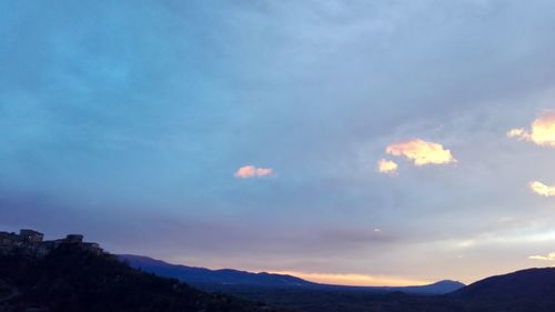 Scenic view of landscape against sky at night