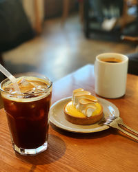 Glass of coffee on table