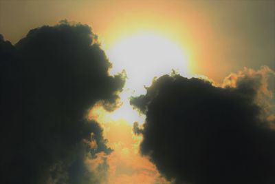 Low angle view of dramatic sky during sunset