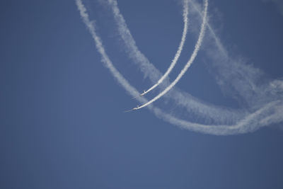 Low angle view of vapor trail in sky