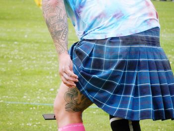 Man wearing blue kilt