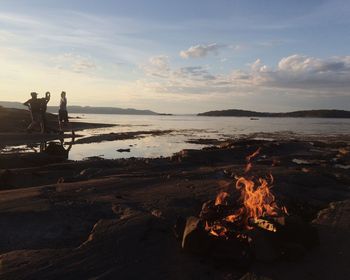 Scenic view of sea at sunset