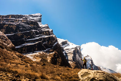 Panoramic view of rocks and mountains against sky