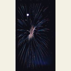 Firework display at night