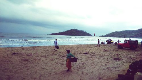 Tourists enjoying at beach