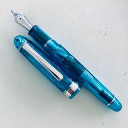 High angle view of pen on table