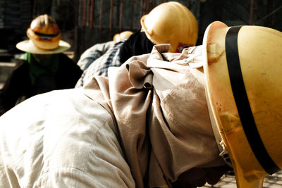 Close-up of manual worker working at construction site