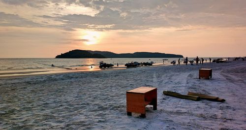 Nature theories, langkawi, malaysia- view of sunset and reflection by the beach.