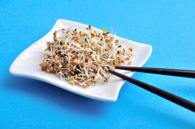 High angle view of rice in plate on table