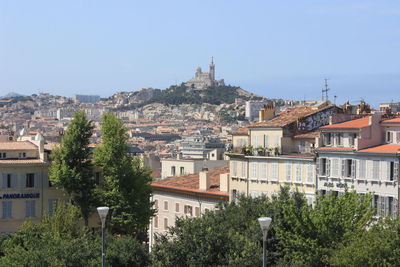 Cityscape against clear sky