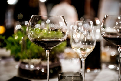 Close-up of wineglasses on table at restaurant