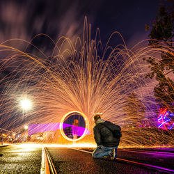 Light trails in sky at night