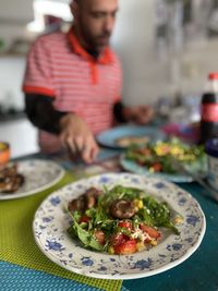 Midsection of man having food