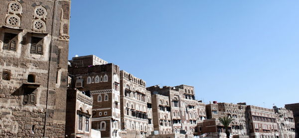 Low angle view of historic building against clear sky