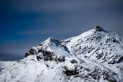 Snowcapped mountains against sky