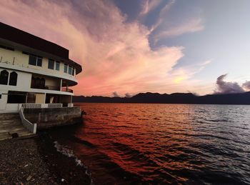 Scenic view of sea against sky at sunset