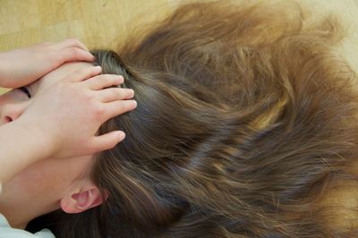 Close-up of girl with long brown hair