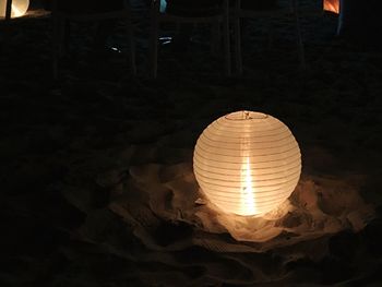 Close-up of illuminated light bulb