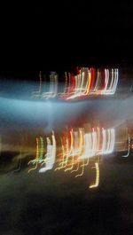 Light trails in water at night