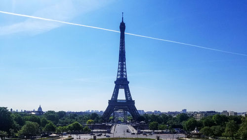 Eiffel tower against blue sky