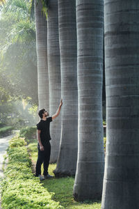 Rear view of man standing in park