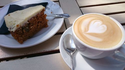 Close-up of served cake and coffee