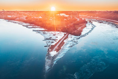 Scenic view of sea against sky during sunset