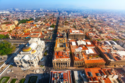 High angle view of buildings against sky in city