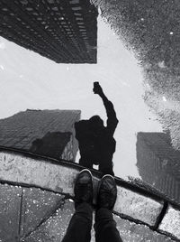 Woman standing in front of building