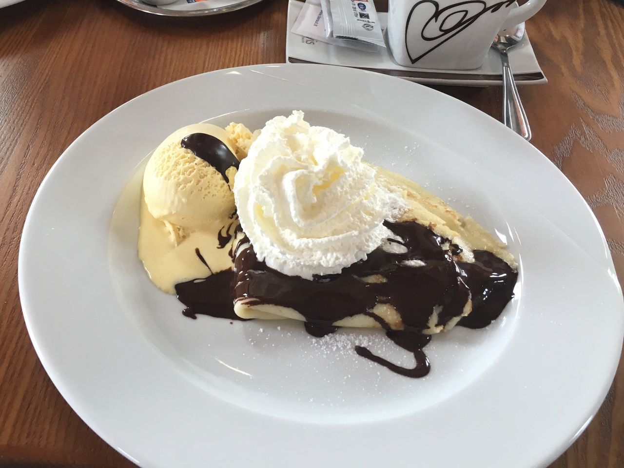 HIGH ANGLE VIEW OF ICE CREAM SERVED IN PLATE