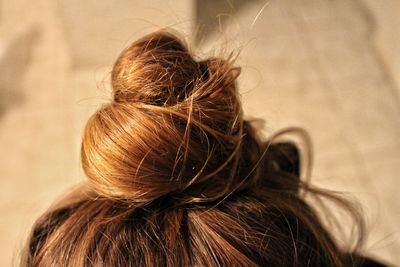 Rear view of woman with hair bun