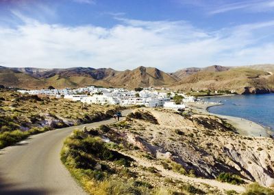 Panoramic view of road amidst mountains against sky