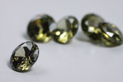 Close-up of green glass on table